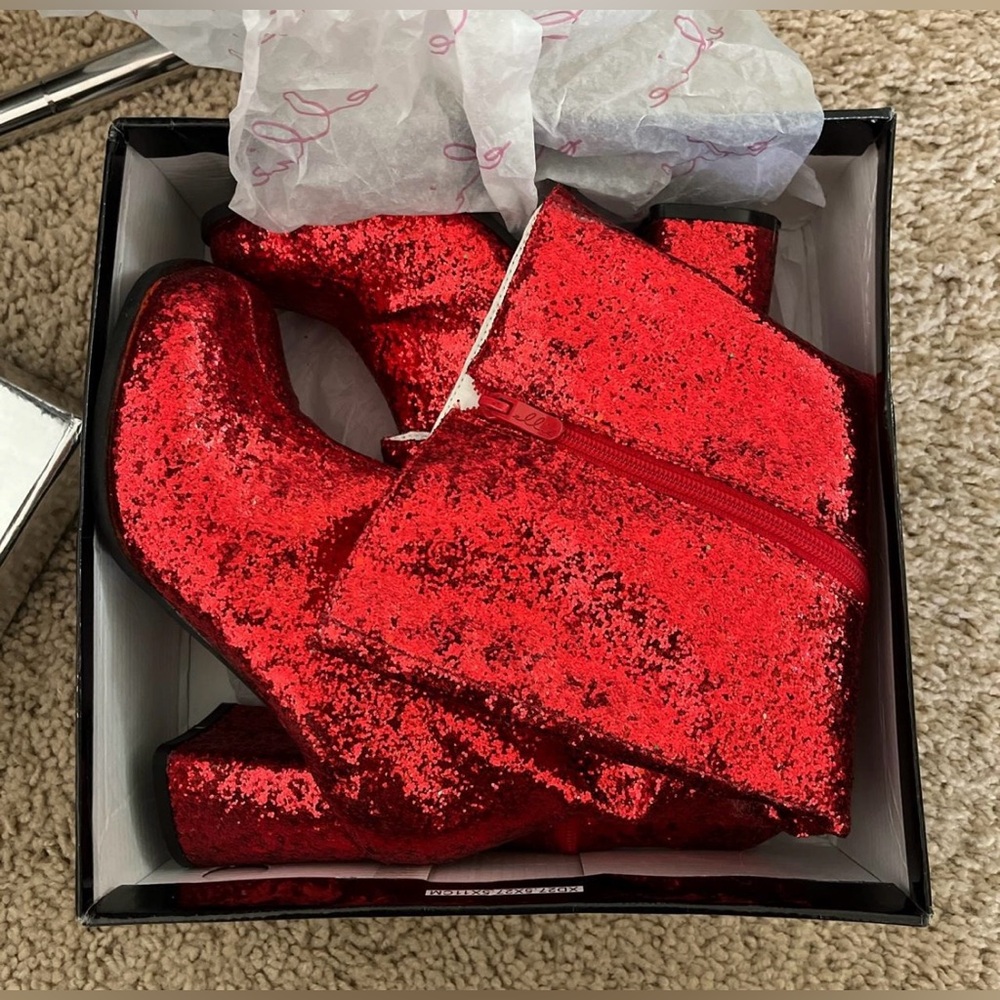 Red sparkly knee high boots